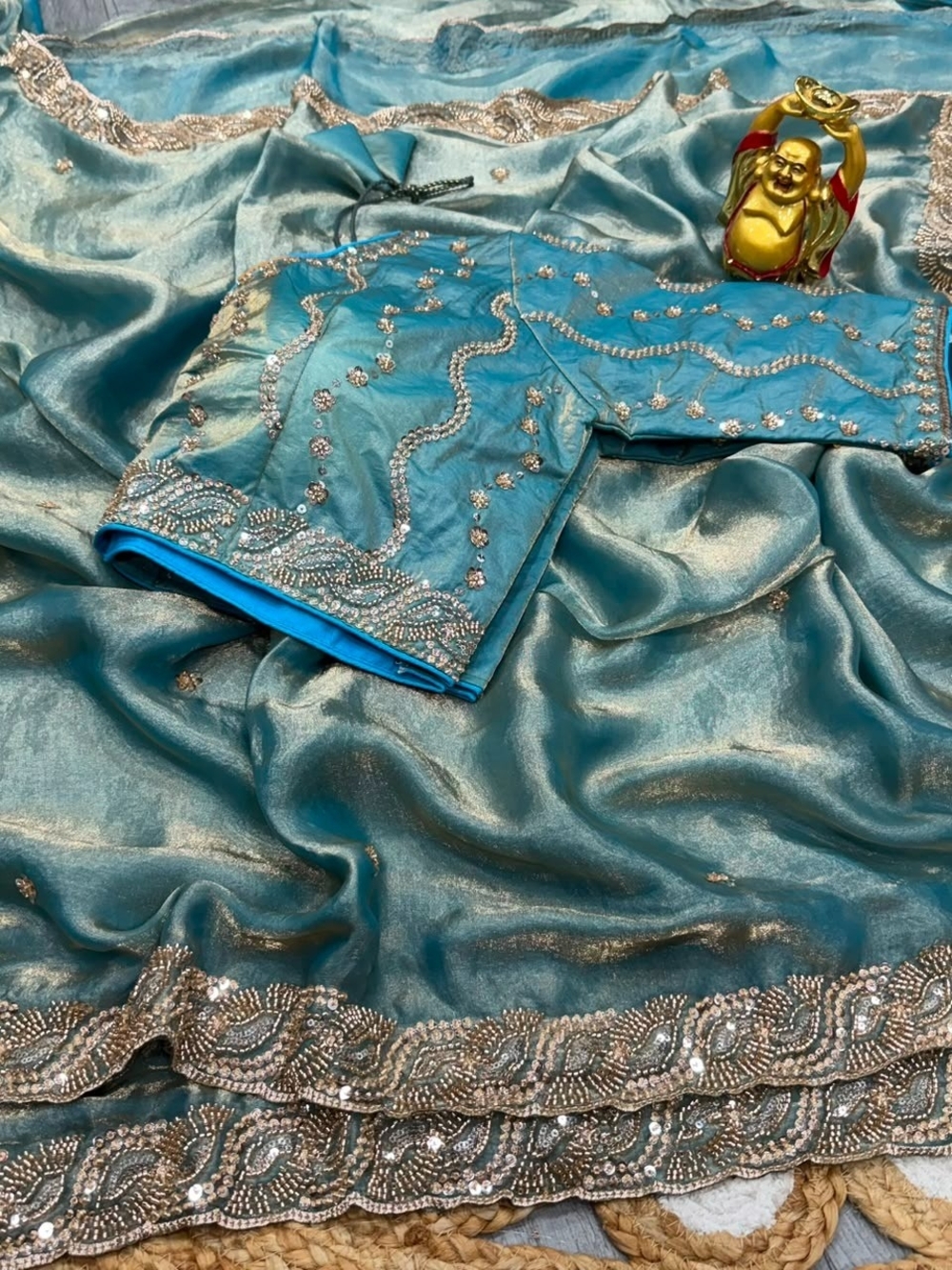 Teal Embellished Saree with Sequined Border